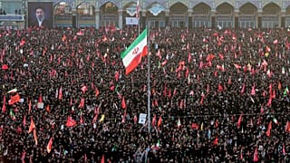 Mourners attend funeral prayers for the late Iranian Supreme Leader Ayatollah Ali Khamenei in Qom, 7 July, 2026