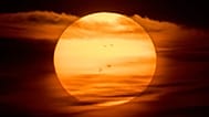 The sun rises over Frankfurt, Germany.
