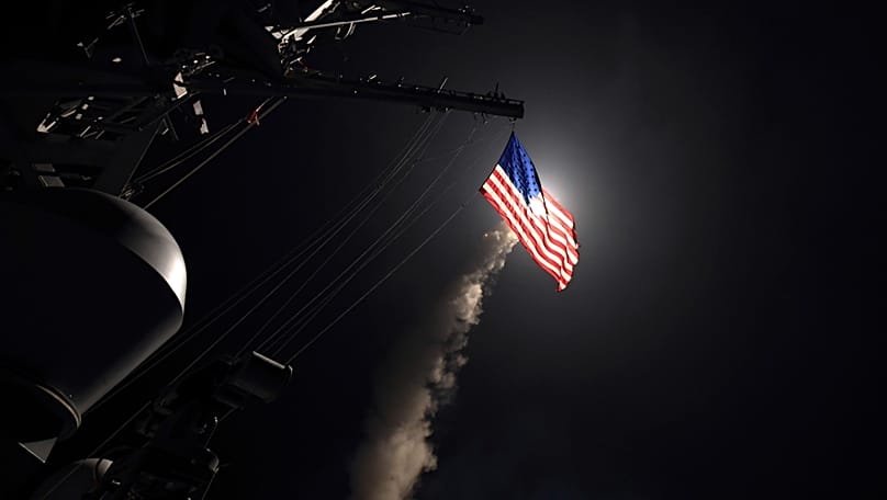 The guided-missile destroyer USS Porter launches a tomahawk land attack missile in the Mediterranean Sea, 7 April, 2017