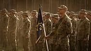 Newly recruited soldiers attend a ceremony as they celebrate the end of their training at a military base close to Kyiv, 25 September, 2023