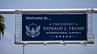 A sign displaying the name of the rebranded Donald J. Trump International Airport in West Palm Beach, 9 July, 2026