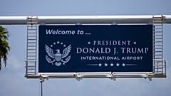 A sign displaying the name of the rebranded Donald J. Trump International Airport in West Palm Beach, 9 July, 2026