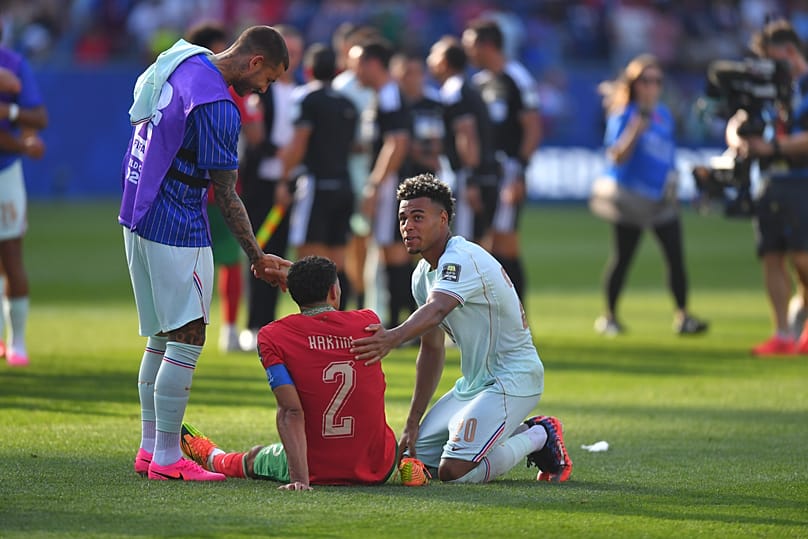 France's Desire Doue (20) comforts Morocco's Achraf Hakimi (2) after the World Cup quarterfinal match in Foxborough, near Boston, Thursday, July 9, 2026.