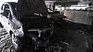 Burned vehicles following firebomb attacks that apparently targeted members of Greece's governing New Democracy party in Thessaloniki, 1 July, 2026