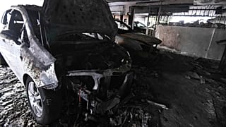 Burned vehicles following firebomb attacks that apparently targeted members of Greece's governing New Democracy party in Thessaloniki, 1 July, 2026