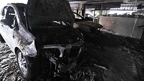 Burned vehicles following firebomb attacks that apparently targeted members of Greece's governing New Democracy party in Thessaloniki, 1 July, 2026