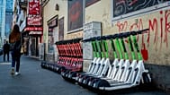 E-scooters are lined up in the red light district in Frankfurt, Germany, Friday, June 7, 2024. 