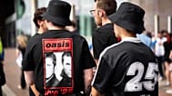Oasis fans gather for the first reunion concert on 4 July 2025 in Cardiff 