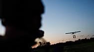 A serviceman with Ukraine’s K-2 brigade launches a midrange drone toward Russian positions on the front line in the Donetsk region, 22 June, 2026