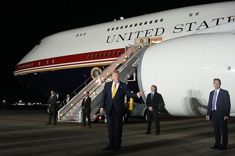 US President Donald Trump speaks while switching planes at RAF Mildenhall in Suffolk, 8 July, 2026