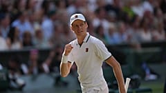 Jannik Sinner of Italy celebrates a point against Novak Djokovic of Serbia in their men's singles semifinal match at Wimbledon, 10 July, 2026