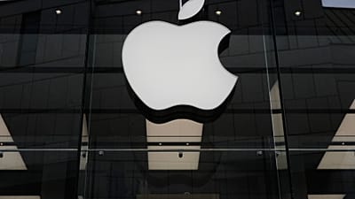 FILE - The Apple logo is illuminated at a store in Munich, April 2, 2026. 