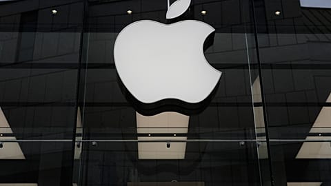FILE - The Apple logo is illuminated at a store in Munich, April 2, 2026. 