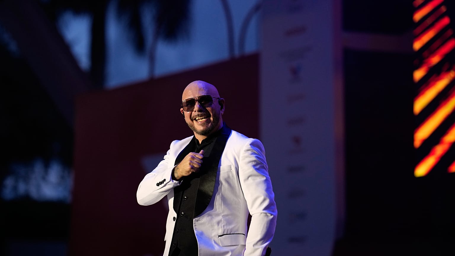 Pitbull gestures as he performs between World Cup matches, at a public watch party at Bayfront Park in downtown Miami, Saturday, 13 June, 2026.