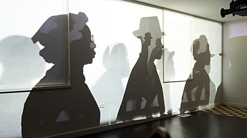 FILE: A video projection by Manual Cinema uses animation at the National Public Housing Museum in Chicago, 2025
