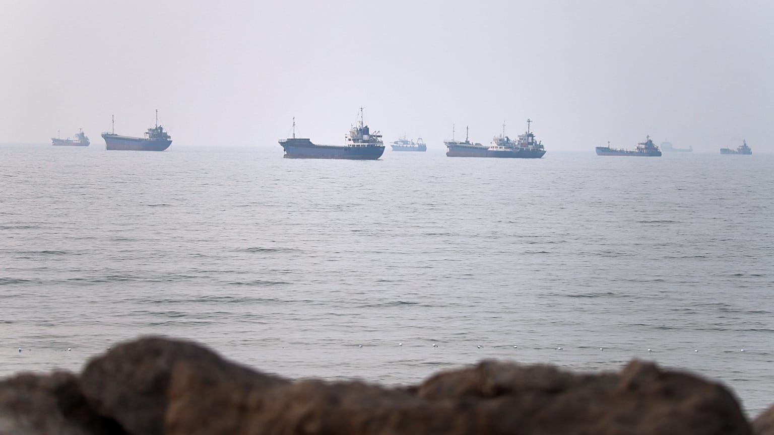 Commercial vessels are seen in the Strait of Hormuz off Bandar Abbas, Iran, Tuesday, June 30, 2026. 