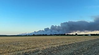Smoke rises above the municipality of Noisy-sur-École, France, 12 July, 2026.
