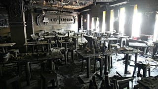 The interior of a beer bar is seen after a fire in Bangkok, 13 July, 2026