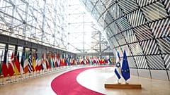 The EU and Israeli flags are seen at the Council of the EU in Brussels