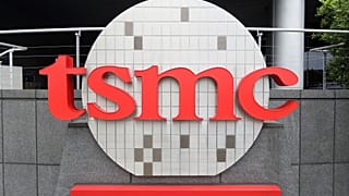 FILE. Taiwan Semiconductor Manufacturing Co., Ltd. (TSMC) logo brands the headquarters in Hsinchu, Taiwan, 20 Oct. 2021