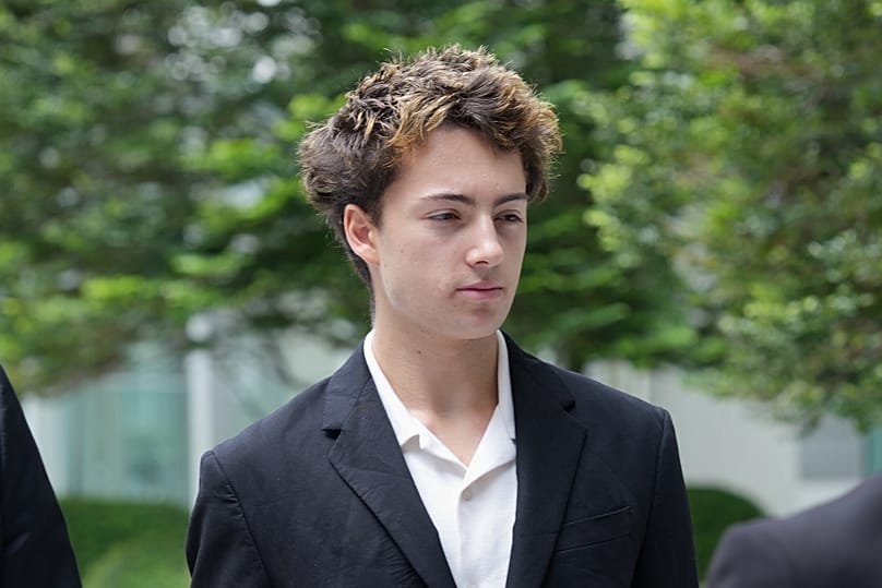 Didier Gaspard Owen Maximilien arrives at the State Courts building in Singapore, 13 July, 2026