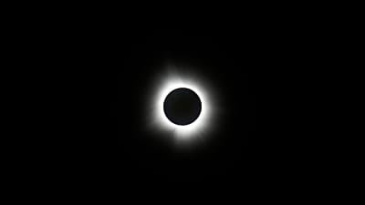 The moon covers the sun during a total solar eclipse on Monday 8 April 2024, as seen from Carbondale, Illinois.