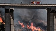 A firefighter truck next to a wildfire in Los Gallardos, 10 July, 2026