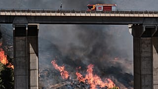 A firefighter truck next to a wildfire in Los Gallardos, 10 July, 2026