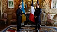 French President Emmanuel Macron, right, talks with Ukrainian President Volodymyr Zelenskyy during a meeting in Paris, France, Monday, July 13, 2026.