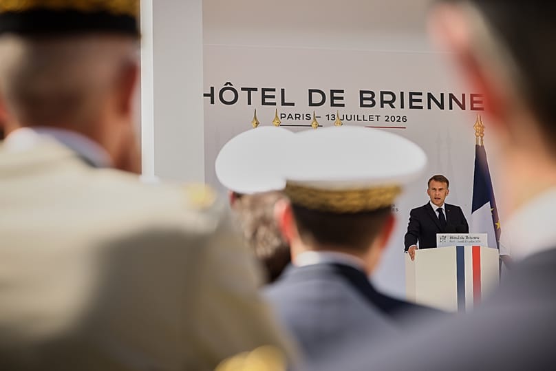 French President Emmanuel Macron delivers his address to the armed forces on the eve of the Bastille Day parade at the Ministry of Defense in Paris, Monday, July 13, 2026. 