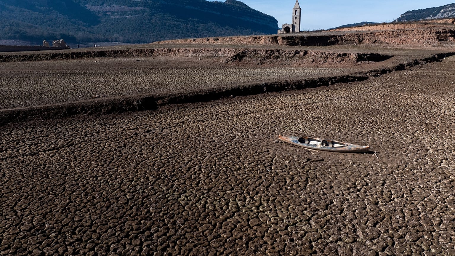 An abandoned kayak lies on the cracked ground at the Sau reservoir, which is only at 5 percent of its capacity, in Vilanova de Sau, about 100 km (62 miles) north of Barcelona,