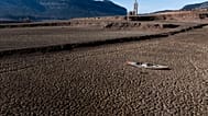 An abandoned kayak lies on the cracked ground at the Sau reservoir, which is only at 5 percent of its capacity, in Vilanova de Sau, about 100 km (62 miles) north of Barcelona,