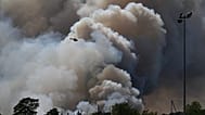 Les pompiers combattent l'incendie de la forêt de Fontainebleau, le 13 juillet 2026
