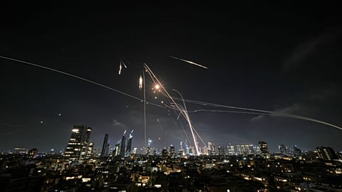 Illustrative image: Israel’s Iron Dome launches missiles over Tel Aviv on 13 June 2025, attempting to intercept incoming rockets.
