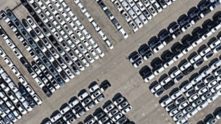 An aerial view of new cars awaiting export to oversea markets is seen at a port in Shanghai, March 10, 2026. (Chinatopix via AP, File)