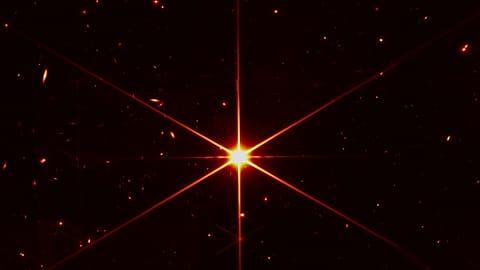 FILE - This image made available by NASA on Wednesday, March 16, 2022 shows star 2MASS J17554042+6551277 used to align the mirrors of the James Webb Space Telescope.