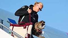 Haaland arrives in Norway carrying a stuffed raccoon.