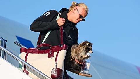 Erling Haaland gets off the plane after his national soccer team landed at Oslo Airport, in Gardermoen, Norway