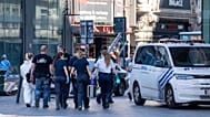 Einsatz- und Spurensicherungskräfte am Brandort eines Gebäudekomplexes im Zentrum von Brüssel, Dienstag, 14. Juli 2026.