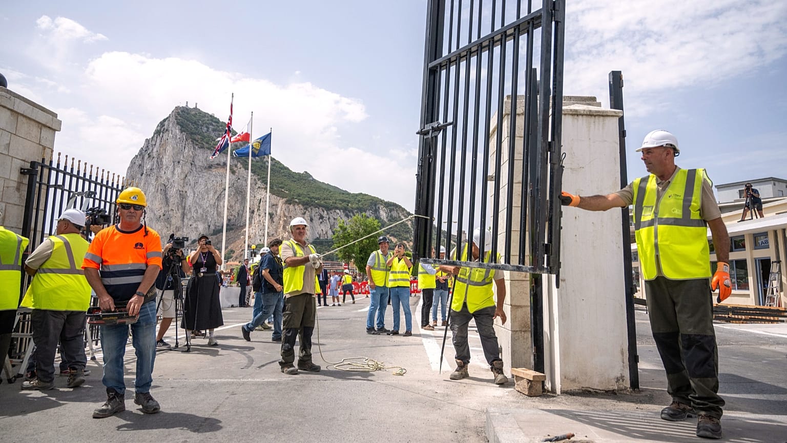 Workers remove the fence separating Gibraltar from Spain in La Línea de la Concepción, 15 July, 2026