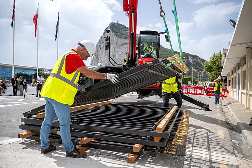Workers remove the fence separating Gibraltar from Spain in La Línea de la Concepción, 15 July, 2026
