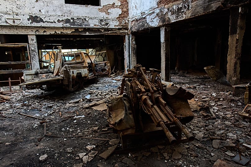 The wreckage of an armoured truck in the lobby of a hotel destroyed during the war in Khartoum, 19 April, 2026