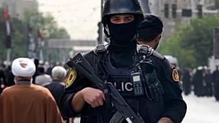 FILE: An Iranian police officer stands guard at Azadi (Freedom) St. in Tehran, 1 August 2024