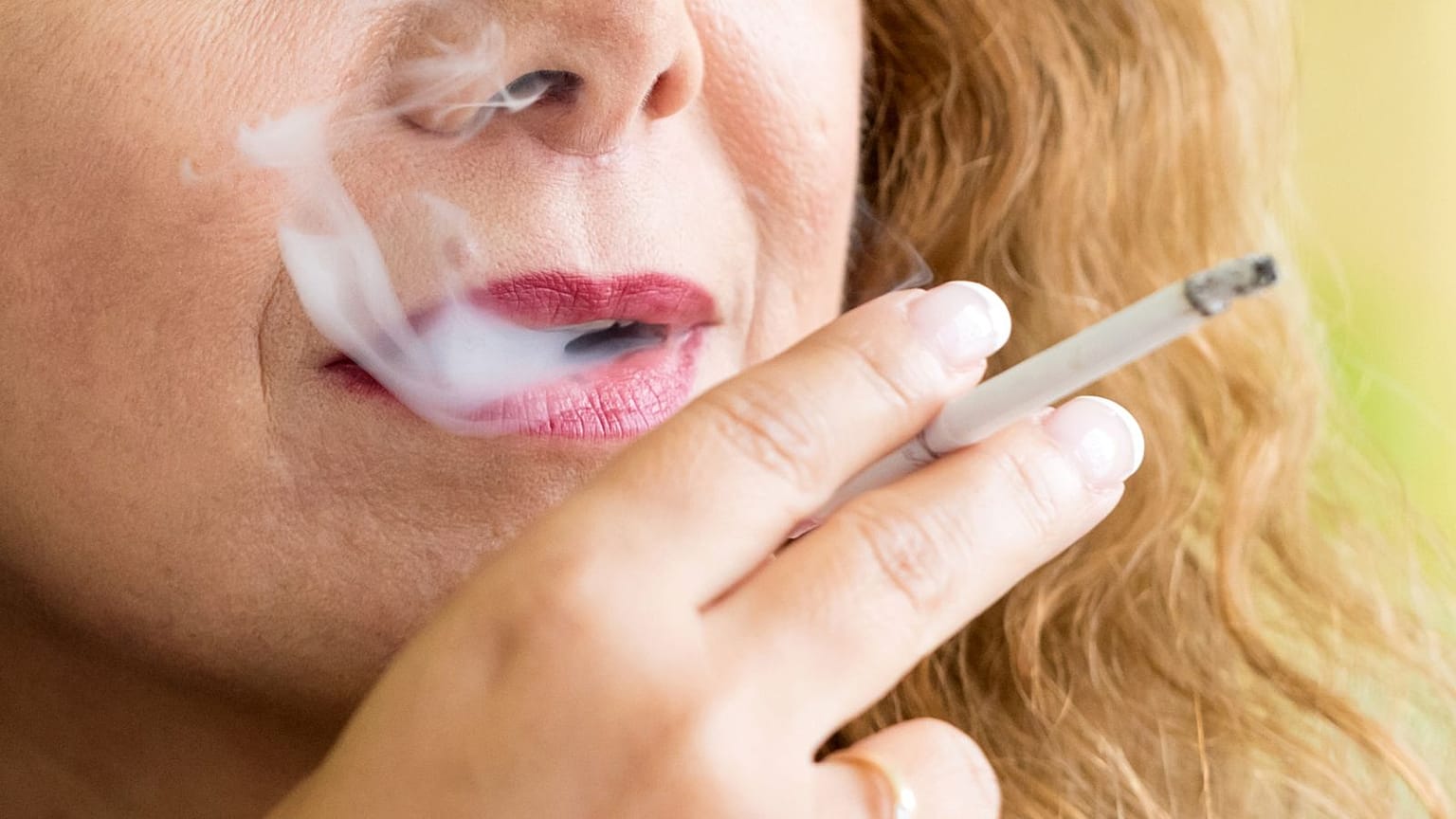 A woman smoking a cigarette