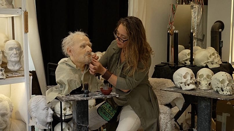 Facial reconstruction artist Emese Gábor works on a model based on a Roman-era skull