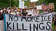 Protesters gather near a U.S. Immigration and Customs Enforcement facility Scarborough, Maine, one day after the shooting of Johan Sebastián Durán Guerrero, Tuesday, July 14.