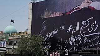 Iran displays new banner showing Trump lying in casket in central Tehran