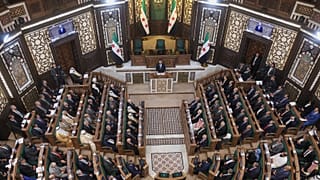 الرئيس السوري الانتقالي أحمد الشرع يلقي كلمة أمام الجلسة الافتتاحية لمجلس الشعب السوري المشكل حديثا، وهي الأولى منذ سقوط حكومة الرئيس بشار الأسد،  سوريا، الأحد 12 يوليو 2026. 