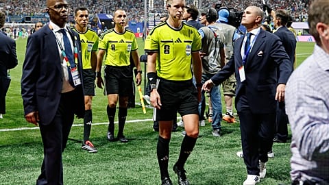 Referee Francois Letexier, of France, leaves the pitch after the World Cup round of 16 soccer match between Argentina and Egypt in Atlanta, Tuesday, July 7, 2026. 