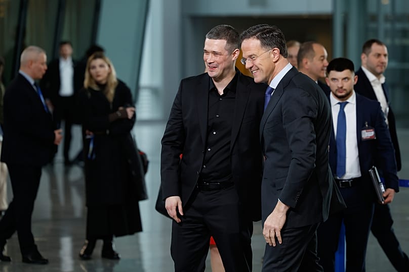FILE: NATO Secretary General Mark Rutte greets Mykhailo Fedorov prior to addressing the media at NATO headquarters Feb. 12, 2026. 